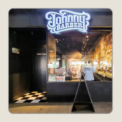 Store front of JOHNNY BARBER